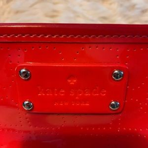 Kate Spade bright red purse.